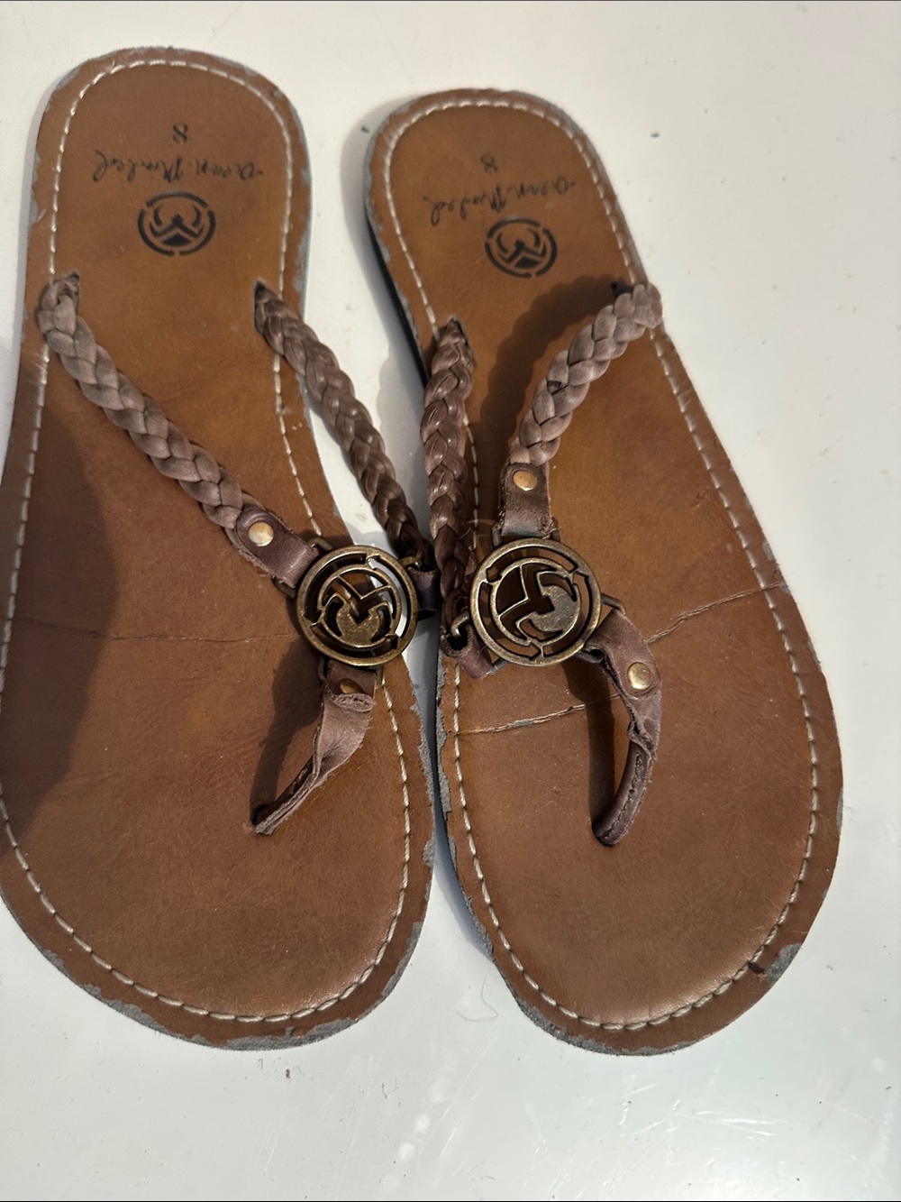 Braided Brown Leather Toe-Post Sandals with Brushed Gold Emblem